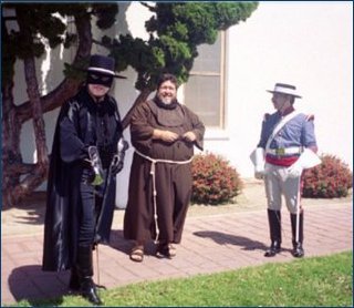 Guy Jr., Father Ben and Wendell Vega